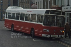 Western Welsh ND5575 (KDW363P), the last of the 1975 NDs, was also swapped and ran for Red & White. Seen here at Coleford Square, working on service 31 to Gloucester. Service 31 had previously been a Lodekka operation, and in the 'post Leyland National' era it reverted to double deck operation - prompting one to question the suitability of the LN as a 'universal bus', as they seemed to be regarded by the WW/R&W/Jones group. Within a year or so of taking this photograph, the view would have changed to show a Welsh fleetname, although this is the nearest point that the route came to Wales, and the border is still 3 or 4 miles away!