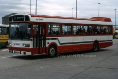 Many years later than the other photographs, Red & White 619 (SKG923S) was new as Western Welsh N5677. By this time the livery had changed, and this 'Red & White' was a different incarnation - not the company that had disappeared into National Welsh back in 1978. I had always regretted the loss of the Red & White name, so it was good to see it revived; and the NBC poppy red never appealed to me, but somehow this livery doesn't work either - perhaps it's the strange step in the grey stripe, or perhaps it is just that white as a relief colour doesn't 'live' in the way that a cream colour does? In any case, the livery didn't survive long, but not really such a great loss. Newport Bus Station, late in 1995.